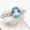 Ring mit 1 Blautopas & 2 Zirkonia